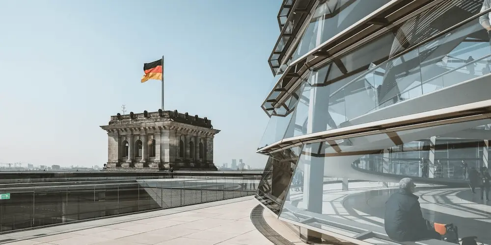 German Flag in front of the German Bundestag building in Berlin